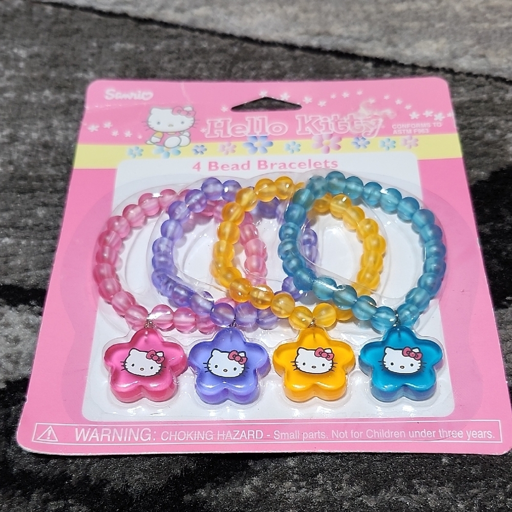 VINTAGE SANRIO 2001 HELLO KITTY 4-PIECE BEAD BRACELETS W/ STAR CHARMS SET